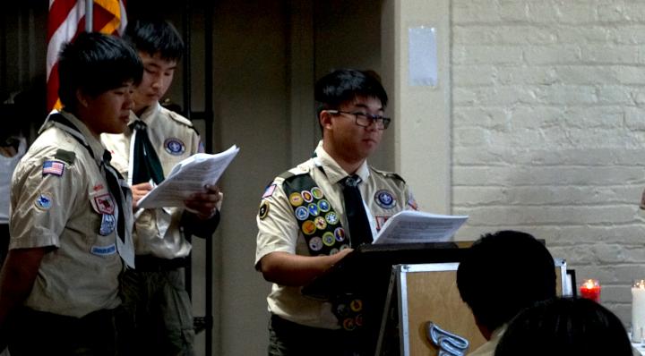 New eagle scout stands at a podium and makes a speech